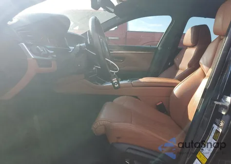 2014 BMW M5 из США, поврежденный, VIN WBSFV9C52ED097461